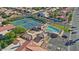 Aerial view showing tennis courts, pool, spa, and community at 24404 S Boxwood Dr, Sun Lakes, AZ 85248