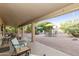 Spacious backyard with patio furniture and multiple seating areas at 24404 S Boxwood Dr, Sun Lakes, AZ 85248