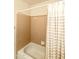 Bathroom with tub, shower, and beige tile at 24404 S Boxwood Dr, Sun Lakes, AZ 85248