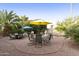 Outdoor patio with seating for dining and entertaining at 24404 S Boxwood Dr, Sun Lakes, AZ 85248