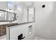 Stylish bathroom showcasing a tiled shower and modern vanity at 32962 N 131St Dr, Peoria, AZ 85383