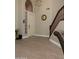 Welcoming entryway with stylish tile flooring, staircase, and decorative accents at 3650 N Barron --, Mesa, AZ 85207