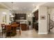 Bright eat-in kitchen featuring dark wood cabinetry, a center island and stainless steel appliances at 3650 N Barron --, Mesa, AZ 85207