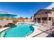 The inviting pool area features a slide, a water feature, and clear blue water for summertime fun at 3650 N Barron --, Mesa, AZ 85207