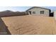 Spacious backyard with block wall; ready for landscaping at 4045 S 177Th Ln, Goodyear, AZ 85338