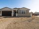 Gray house with a two-car garage and a walkway to the entrance at 4045 S 177Th Ln, Goodyear, AZ 85338