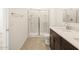 Modern bathroom with double sinks, shower, and toilet at 9109 N 173Rd Ln, Waddell, AZ 85355