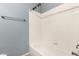 Bathroom featuring standard white tub/shower with white tile surround and light blue wall paint at 1335 E June St # 239, Mesa, AZ 85203
