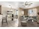 Inviting living room with tile floors, a cozy seating area, and a sliding glass door at 1335 E June St # 239, Mesa, AZ 85203