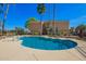 Community swimming pool offers plenty of lounge space and clear blue water for recreation at 1335 E June St # 239, Mesa, AZ 85203
