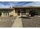 Ranch style home with landscaped front yard and walkway at 13428 N Hawthorn Dr, Sun City, AZ 85351
