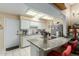 Kitchen with granite countertops and stainless steel appliances at 13428 N Hawthorn Dr, Sun City, AZ 85351