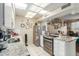 Kitchen with granite countertops and stainless steel appliances at 13428 N Hawthorn Dr, Sun City, AZ 85351