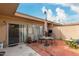 Outdoor patio with seating and grill, ideal for entertaining at 13428 N Hawthorn Dr, Sun City, AZ 85351