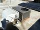 Efficient rooftop AC unit with solar panels at 13428 N Hawthorn Dr, Sun City, AZ 85351
