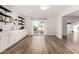 Modern kitchen with white cabinets and wood-look floors at 18607 N 125Th Ave, Sun City West, AZ 85375