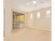 Bedroom featuring a ceiling fan, dual windows and access to balcony at 2121 W Tallgrass Trl # 126, Phoenix, AZ 85085