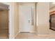 Inviting foyer with tile flooring, neutral walls, and a solid white front door for a clean and modern entrance at 2121 W Tallgrass Trl # 126, Phoenix, AZ 85085