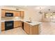 Bright kitchen features quartz countertops and stainless steel appliances at 2121 W Tallgrass Trl # 126, Phoenix, AZ 85085