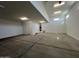 Large garage with high ceilings and ample space for storage at 22874 E Alyssa Rd, Queen Creek, AZ 85142