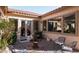 Private courtyard with fountain, seating area, and brick pavers at 2430 W Horsetail Trl, Phoenix, AZ 85085