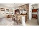 Island kitchen with granite counters and stainless steel appliances at 2430 W Horsetail Trl, Phoenix, AZ 85085