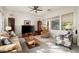 Living room with neutral decor and plenty of natural light at 2430 W Horsetail Trl, Phoenix, AZ 85085