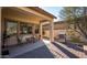 Outdoor patio with seating, grill, and brick pavement at 2430 W Horsetail Trl, Phoenix, AZ 85085