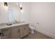 Modern powder room with a floating vanity at 4411 E Gemini Pl, Chandler, AZ 85249