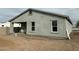 Rear view of the house, highlighting the backyard and patio at 11474 N 79Th Dr, Peoria, AZ 85345