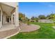 Lush green backyard with well-manicured lawn and landscape, offering a serene outdoor space at 2121 N Orchard --, Mesa, AZ 85213