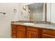 Bathroom vanity with granite countertops and custom wood cabinetry provides ample space at 2121 N Orchard --, Mesa, AZ 85213