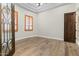 Spacious bedroom featuring hardwood floors and two shuttered windows at 2121 N Orchard --, Mesa, AZ 85213