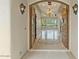 Grand foyer with ornate double doors and an elegant lighting fixture above at 2121 N Orchard --, Mesa, AZ 85213