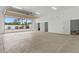 Spacious garage with open door, perfect for vehicle storage and projects at 2121 N Orchard --, Mesa, AZ 85213