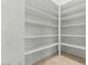 Large walk-in pantry with ample shelving for organized storage at 2121 N Orchard --, Mesa, AZ 85213