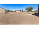 Large backyard with a tree and shed in background at 35852 N 10Th St, Phoenix, AZ 85086