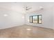 Bright bedroom with large window and ceiling fan at 35852 N 10Th St, Phoenix, AZ 85086