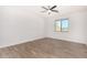 Simple bedroom with hardwood floors and a window at 35852 N 10Th St, Phoenix, AZ 85086