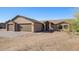 Contemporary home with a three-car garage and desert landscaping at 35852 N 10Th St, Phoenix, AZ 85086