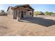 Front view of a new construction home with a covered patio at 35852 N 10Th St, Phoenix, AZ 85086