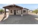 Newly built home with covered porch and desert landscaping at 35852 N 10Th St, Phoenix, AZ 85086