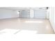 Clean and spacious two-car garage featuring an epoxy floor at 35852 N 10Th St, Phoenix, AZ 85086