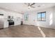 Bright kitchen with white shaker cabinets and stainless steel appliances at 35852 N 10Th St, Phoenix, AZ 85086