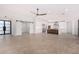 Open living space with kitchen, barn doors, and tile flooring at 35852 N 10Th St, Phoenix, AZ 85086