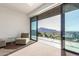 Bedroom with sliding glass doors and mountain views at 4060 E Lamar Rd, Paradise Valley, AZ 85253