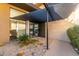 Modern entryway with pergola and drought-tolerant landscaping at 4060 E Lamar Rd, Paradise Valley, AZ 85253