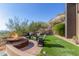 Relaxing patio with firepit and seating, mountain views at 4060 E Lamar Rd, Paradise Valley, AZ 85253