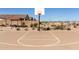 Community basketball court with nearby picnic tables offer residents outdoor activity and socializing at 4488 W Charlie Dr, San Tan Valley, AZ 85144