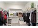 Walk-in closet with shelving and ample space for storage and organization at 4488 W Charlie Dr, San Tan Valley, AZ 85144